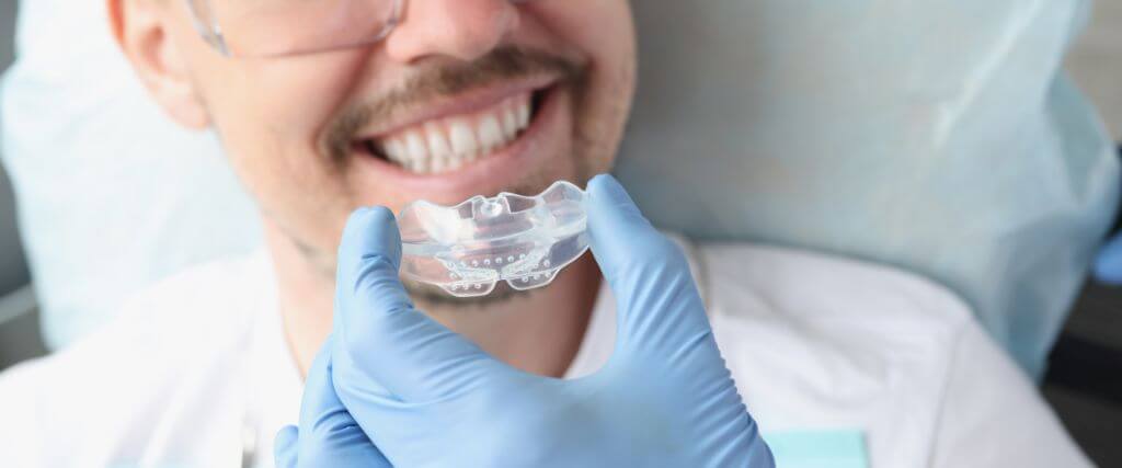 Night Guards for Teeth Grinding: How They Protect Your Smile